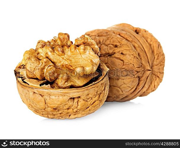 Half walnut kernel and whole walnut isolated on white background