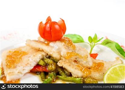 halibut filet roast at lime juice and vegetables