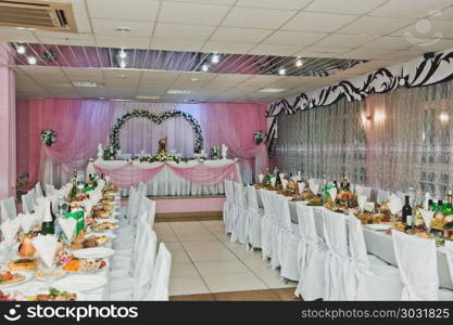 Hall for celebration of a wedding banquet.. Festively decorated hall for ceremony 2782.. Festively decorated hall for ceremony 2782.