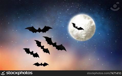 halloween and decoration concept - black bats flying over moon in starry night sky background. black bats flying over moon in starry night sky