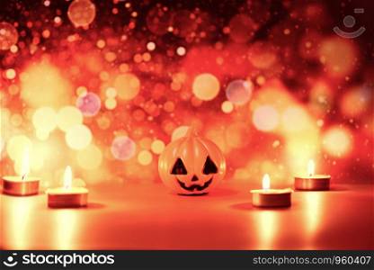 Halloween background candlelight orange decorated holidays festive concept / funny faces jack o lantern pumpkin halloween decorations for party accessories object with candle light bokeh