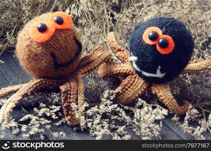 Halloween background with handmade pumpkin, funny spider, with knitted decoration for holiday seasonal, scary festival on october, orange is symbol color, so amazing with starfish, woolen spider
