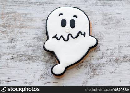Halloween cookie with ghost shape. Sweet tradition