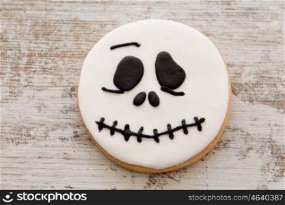 Halloween cookie with skull shape. Sweet tradition