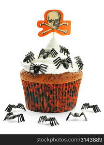 Halloween cupcake with decoration isolated on white