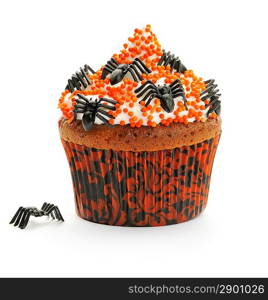 Halloween cupcake with whipped cream and decoration isolated on white