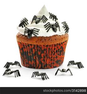 Halloween cupcake with whipped cream and decoration isolated on white