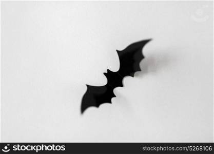 halloween, decoration and scary concept - black bat over white background. halloween decoration of black bat on white