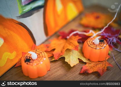 Halloween decorations background. Halloween Scary pumpkin head on wooden table Halloween holiday concept.