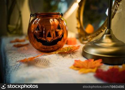 Halloween decorationsbackground. Halloween Scary pumpkin head on wooden table Halloween holiday concept