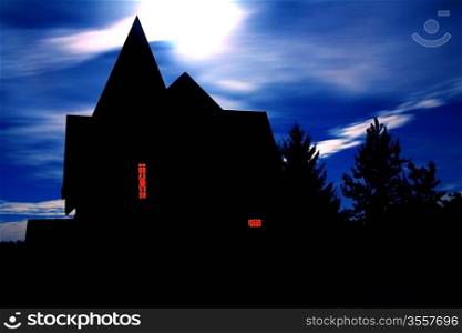 Halloween house against a cloudy sky Moon