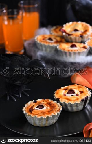 Halloween mini Creepy Eye Cakes with cherry filling