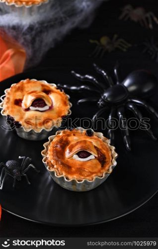 Halloween mini Creepy Eye Cakes with cherry filling