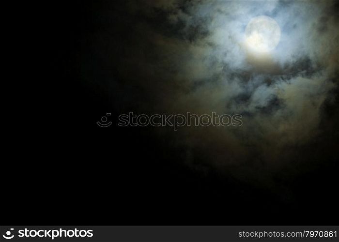 Halloween night, Full Moon shines through the horrible cloud