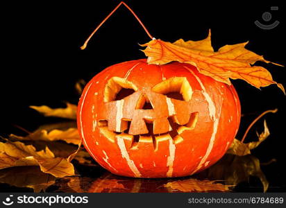 Halloween - old jack-o-lantern on black background