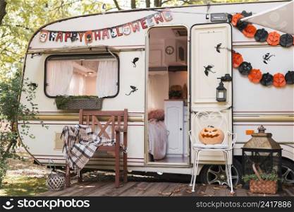 halloween outdoors arrangement with caravan