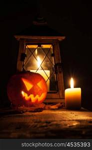 Halloween pumpkin and lantern. Halloween pumpkin and lantern with candle on black background
