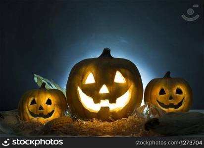 Halloween Pumpkin Burning with copy space. Dark background