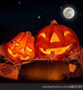 Halloween pumpkin decoration on night sky background, full moon, invitation on festive party, jack-o-lantern, horror concept