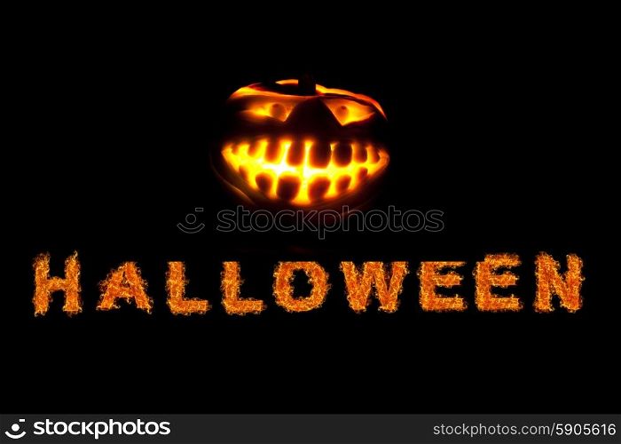 Halloween pumpkin. Halloween pumpkin with scary face on black backgound