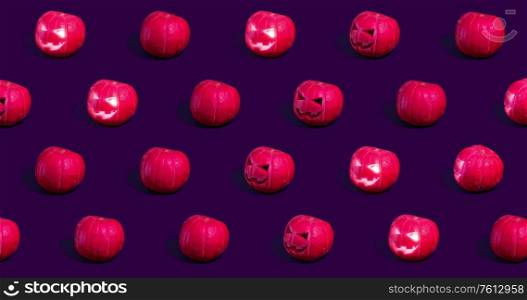 Halloween pumpkins Jack o&rsquo;Lantern on purple background.. Halloween pumpkins or Jack o&rsquo;Lantern