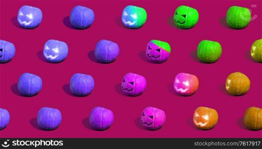 Halloween pumpkins Jack o&rsquo;Lantern on purple background.. Halloween pumpkins or Jack o&rsquo;Lantern