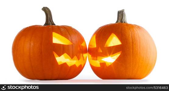 Halloween Pumpkins on white. Two Halloween Pumpkins looking to each other isolated on white background