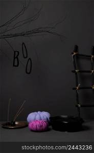 halloween pumpkins with bright colored tree and ladder on a dark background. halloween with pumpkin and tree