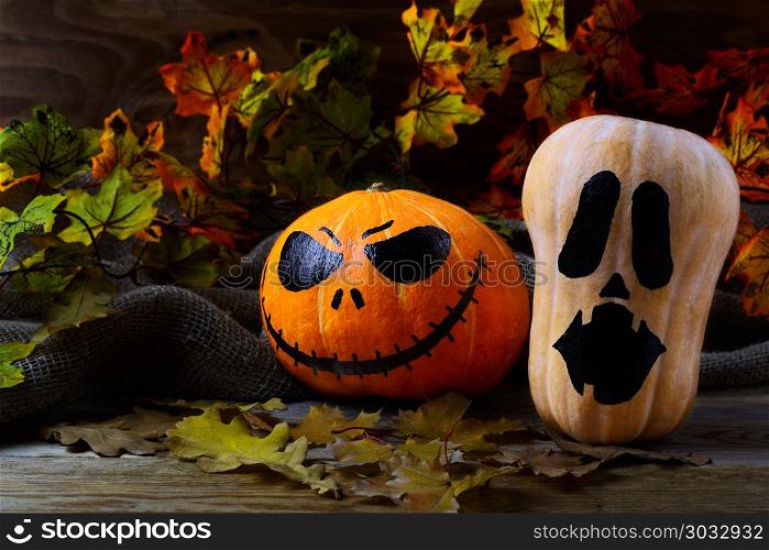 Halloween Stingy Jack pumpkins on dark rustic background. Halloween Stingy Jack pumpkins on dark rustic background. Halloween symbol jack-o-lantern background. Halloween decoration.