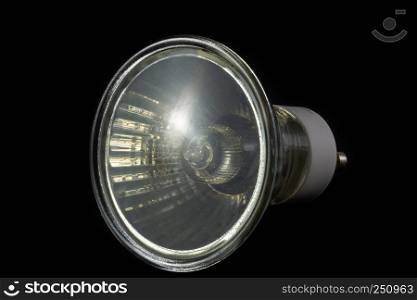 Halogen bulb of GU10 type on a black background close-up