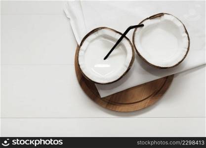 halved coconut white napkin