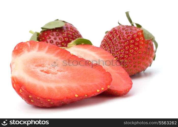 Halved strawberries isolated on white background