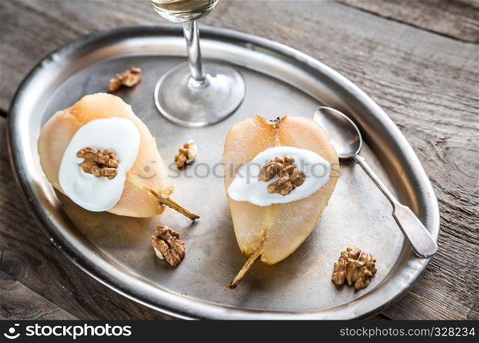 Halves of poached pear