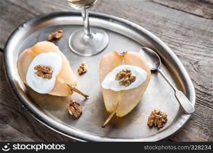Halves of poached pear