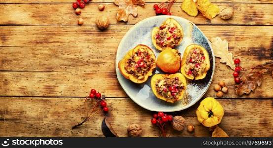 Halves quince stuffed with minced meat. Autumn recipe. Flat lay with copy space. Quince stuffed with meat