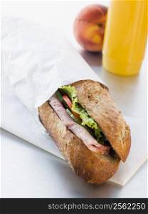 Ham And Salad Granary Baguette With Mango And Banana Smoothie And A Nectarine
