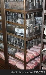 Ham in production proces in a cold cut factory