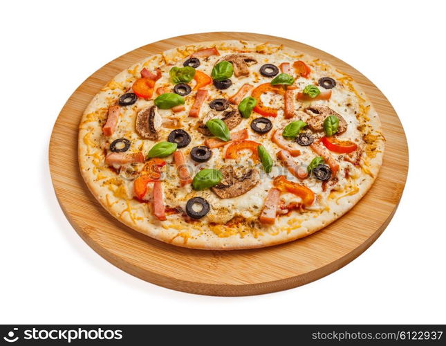 Ham pizza with capsicum, mushrooms, olives and basil leaves isolated on white