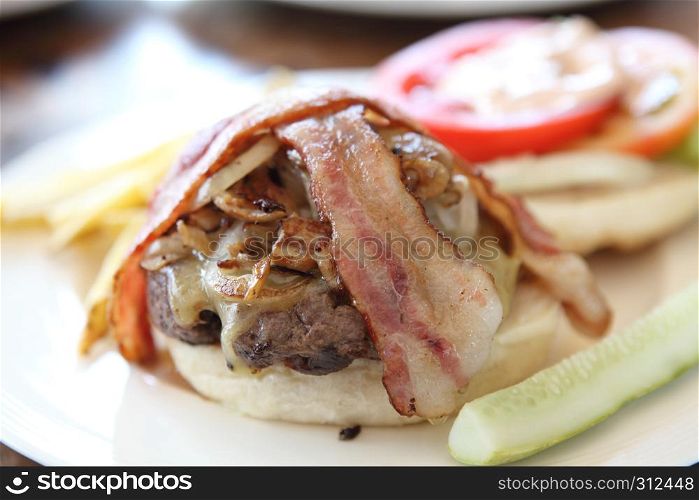 hamburger with fries and salad