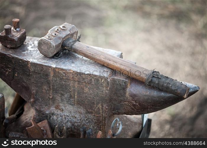 hammer on blacksmith anvil