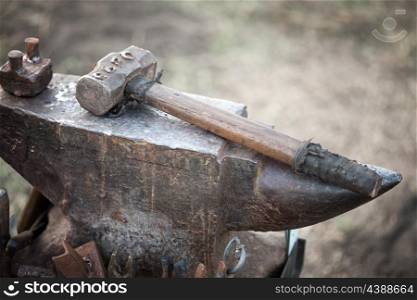 hammer on blacksmith anvil