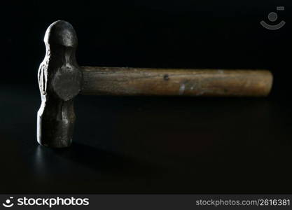 Hammer selective focus over black background