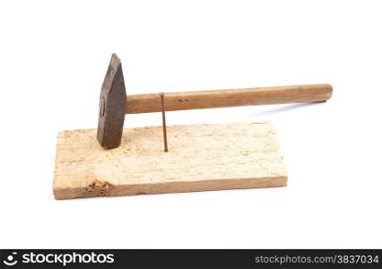 Hammer with nail and board