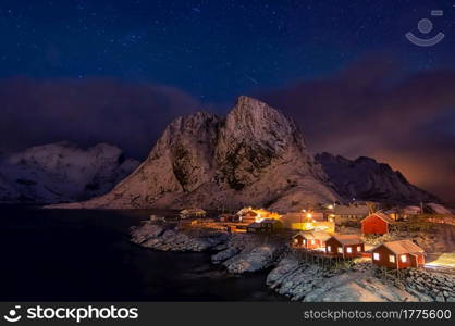Hamnoy village in Lofoten islands of Norway in winter time at night.. Hamnoy village in winter.