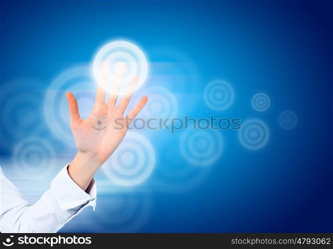 Hand and icons. Close up of human hand pushing media icon