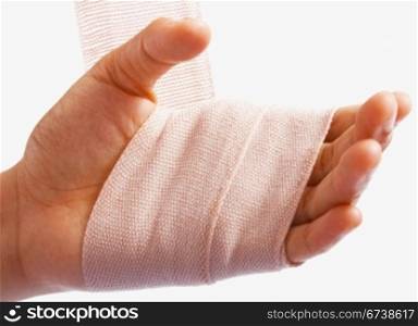 Hand Being Bandaged After A Small Injury