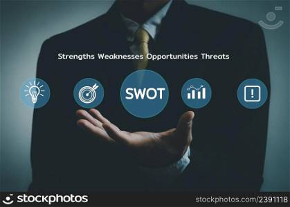 Hand businessman icon SWOT strengths weaknesses opportunities threats  virtual screen.Business marketing Concept.