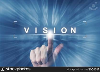 hand clicking on business vision button with zoom effect background
