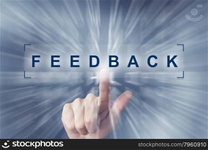 hand clicking on feedback button with zoom effect background