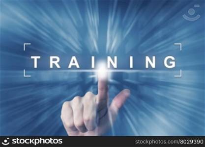 hand clicking on training button with zoom effect background